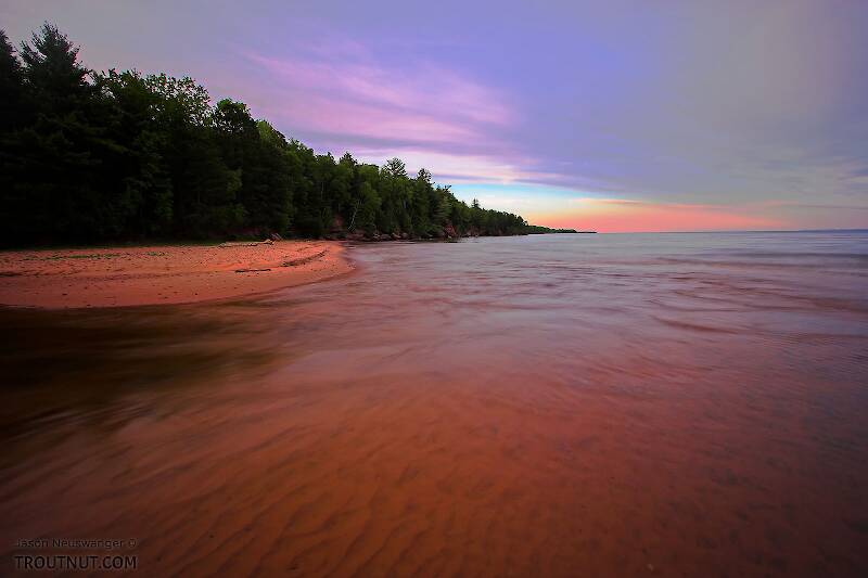 This is the shore of a beautiful island in Lake Superior.  To the left is a narrow channel leading to a a large, shallow bay.

From Big Bay on Madeline Island in Lake Superior in Wisconsin