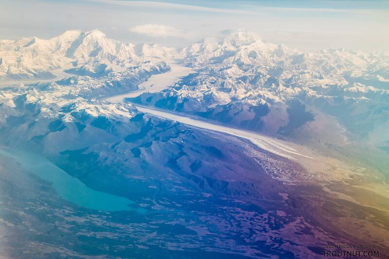 Mt Foraker (left), Denali (right), Kahiltna Glacier, and Chelatna Lake, the outlet of which (Lake Creek) is known for great fishing and difficult floating. Viewed from a flight from Kotzebue to Anchorage.

From Denali National Park in Alaska
