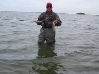 One of our members...I thought I was hard to get off the water..."Just one more cast dear." ;) This fella can fish!