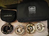 ...the saltwater fly reels are at the ready, and if you count spools they outnumber the spinning reels! Yup, the Lamson 3-pack is new, and loaded with three 7-weight lines I have had for ? long: WF Fl, DT Fl, WF ST