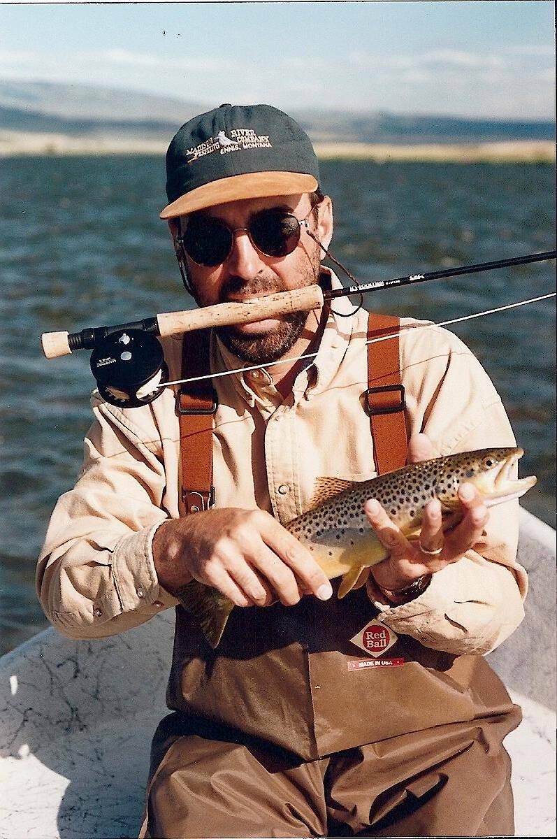 Why do we all have one of these shots? Rod in mouth? This shot was for the Michigan Fly Fishing Club because the Loomis rod there I won at my first club meeting after I had paid my dues.