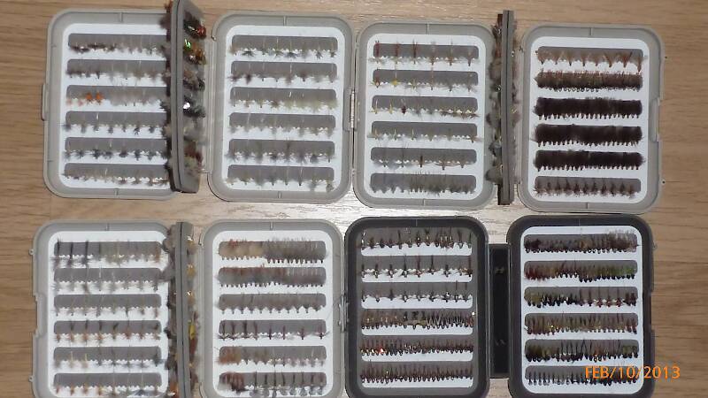 A close-up of four of my six C&F boxes. The two boxes in the upper row are various PMD emergers, duns, and spinners and also a gazillion cinnamon CDC caddis adults, pupa, and spent caddis.  THe bottom left hand box is all Ep dorothea (Sulfur) emergers, duns, and spinners in #18 - #22.  There is a Myran box for the #16 duns and emergers and a larger 4" x 6" box for Ep invaria #14.  I've got my boxes set-up to be hatch specific.  Separate boxes for every hatch that I encounter on the Delaware system and the Montana tailwaters and spring creeks.